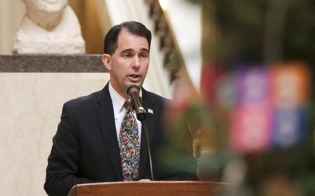 Wisconsin’s Defeated Gov. Scott Walker Signs Law Diminishing Power Of Man Who Beat Him